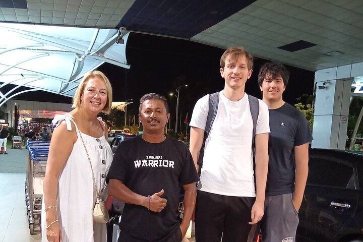 KIYON driver greeting travellers on arrival for an airport pickup